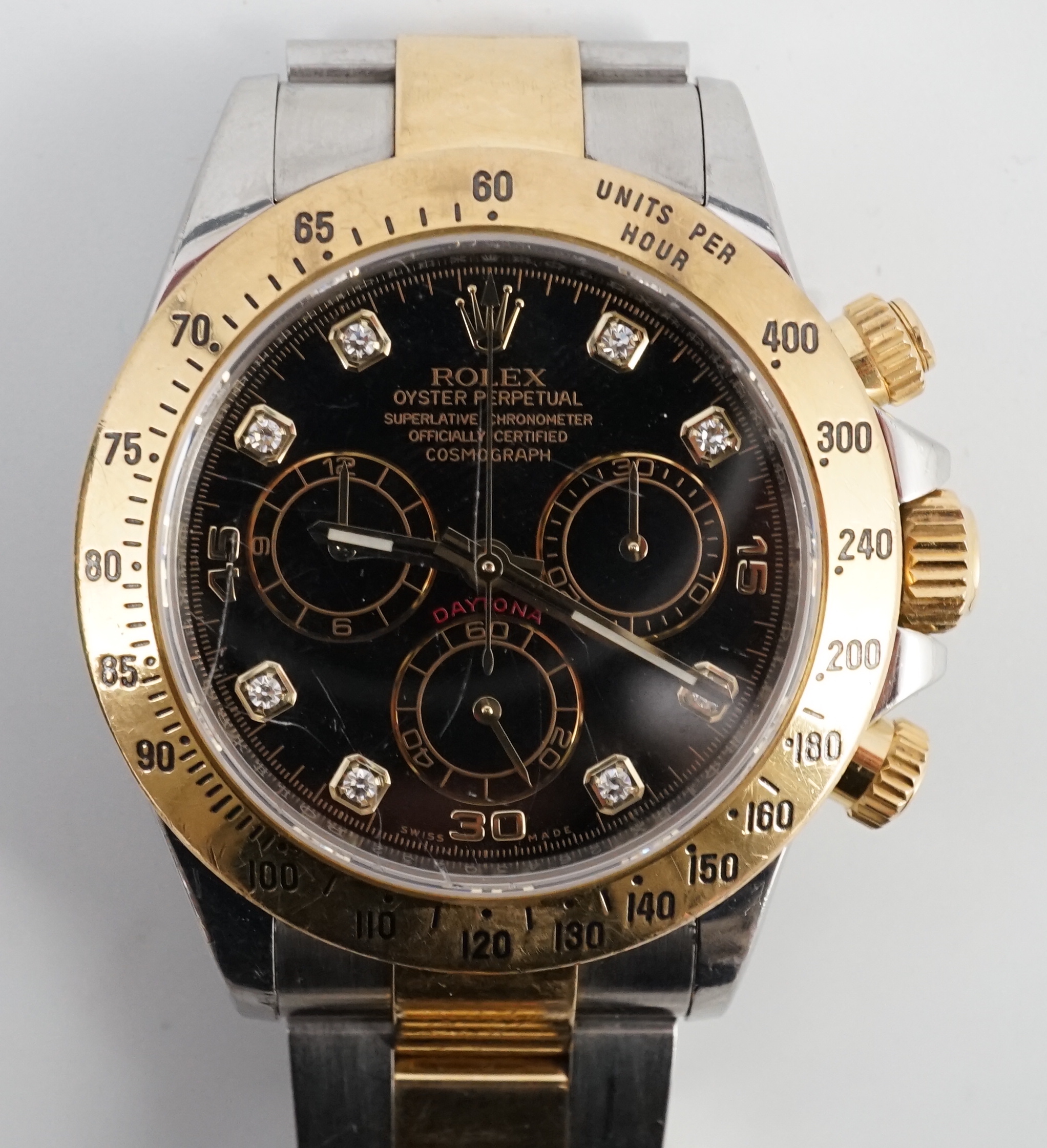 A gentleman's 2015 18ct gold and stainless steel Rolex Oyster Perpetual Daytona Cosmograph wrist watch, on an 18ct gold and stainless steel Rolex bracelet